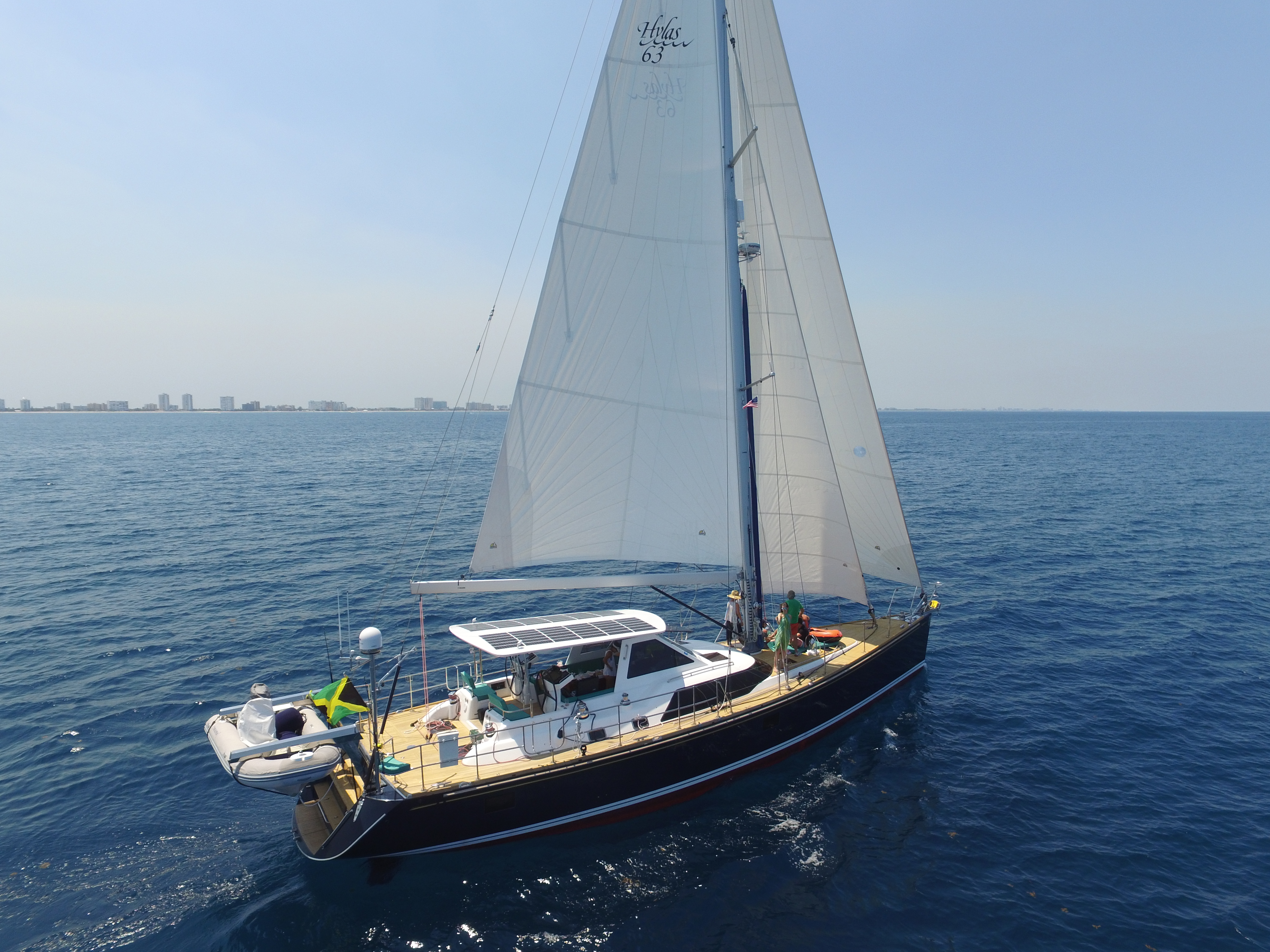Hylas 63 sailing hardtop and solar array underway offshore