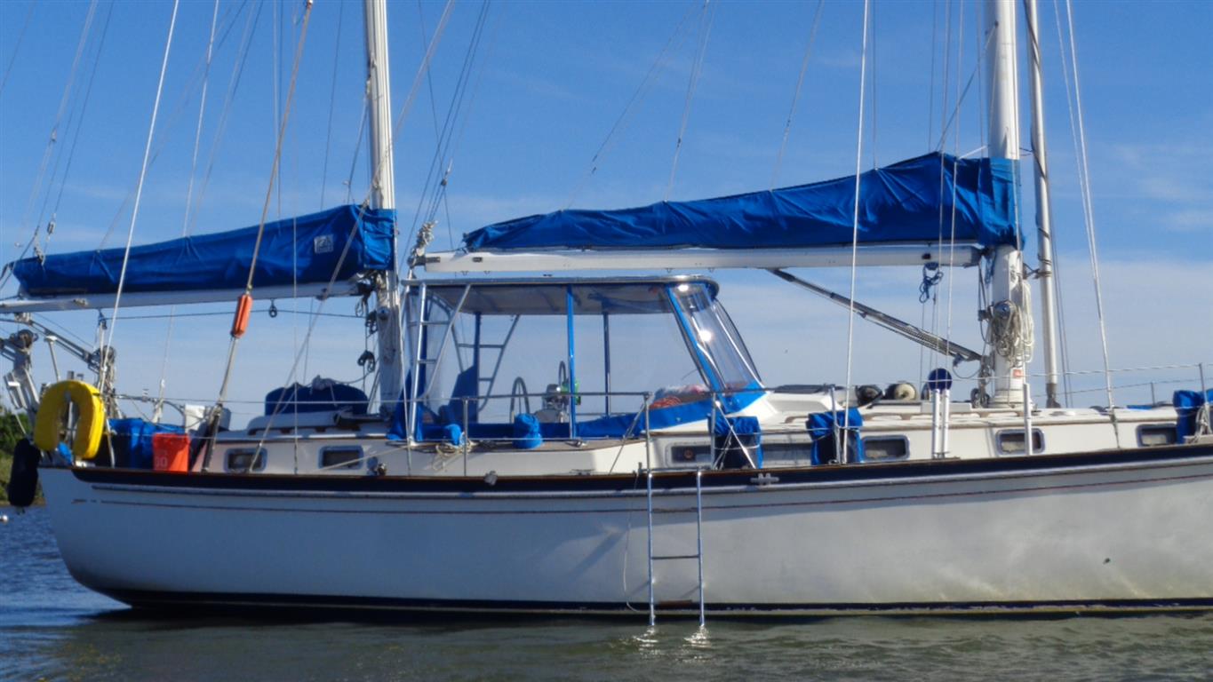Whitby 42 center-cockpit sailing hardtop viewed from port side